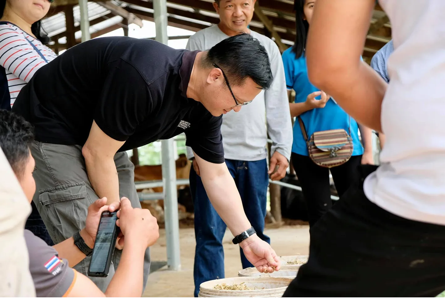 On a cattle farm visit with farmers and students